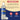 A bottle of Torani Sweetener sugar-free syrup on a beige and dark blue graphic background with text detailing ingredients and product features.