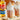 Two glasses of pumpkin spice drinks with whipped cream 