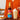 Torani pumpkin pie syrup bottle with a glass of pumpkin spice latte and whipped cream.