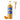 A bottle of Torani pumpkin pie flavored syrup with a gold pump dispenser and a slice of orange pumpkin on a white background.